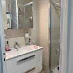 rénovation appartement salle de bain douche meuble vasque miroir éclairant à rangement Saint Etienne Cours Fauriel
