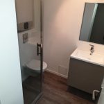 rénovation appartement salle d'eau meuble vasque sol lames pvc douche paroi verre Lille