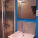 rénovation d'une salle de bains à Marcq-en-Baroeul : nouvelle vasque et miroir