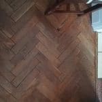 Zoom sur le parquet du salon avant rénovation - Rénovation de sols à Lambersart