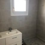 Salle de bain rénovée - rénovation d'une maison à Montigny Le Bretonneux