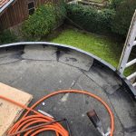 Pose de l'étanchéité première couche - - rénovation d'un toit terrasse à Cognac