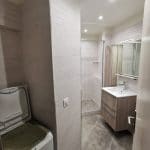 Niche accueillant lave linge - rénovation de salle de bain au Kremlin Bicêtre