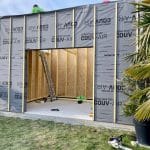 Montage des murs et pose de l'isolation - Construction d'une extension maison en bois à Arques