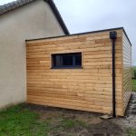 Création d'une extension bois à toit plat à Forêt la Folie dans l'Eure