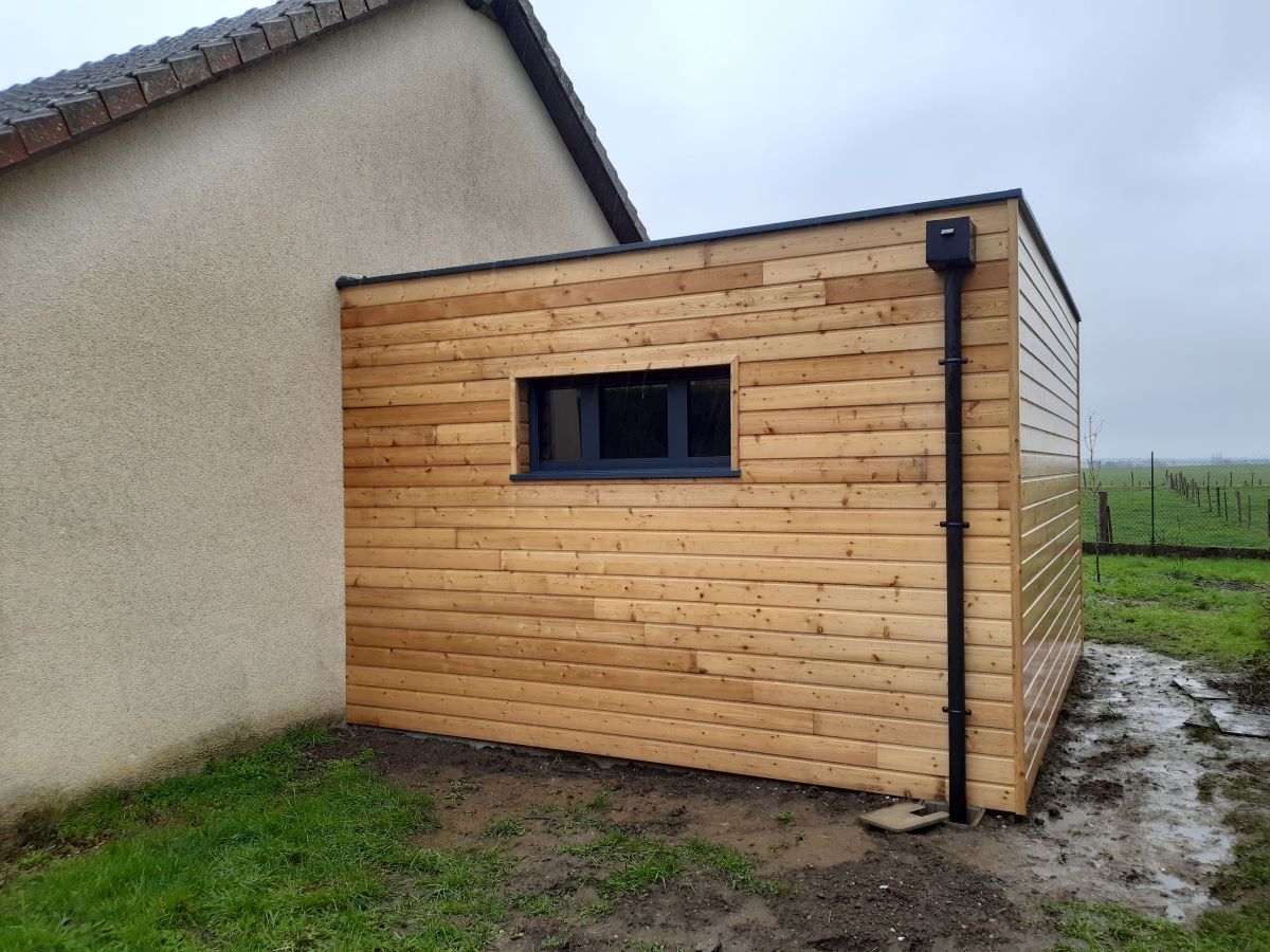 Création d'une extension bois à toit plat à Forêt la Folie dans l'Eure