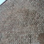 Zoom sur le mur rénové ravalement de façade en rejointoiement. à Tourcoing