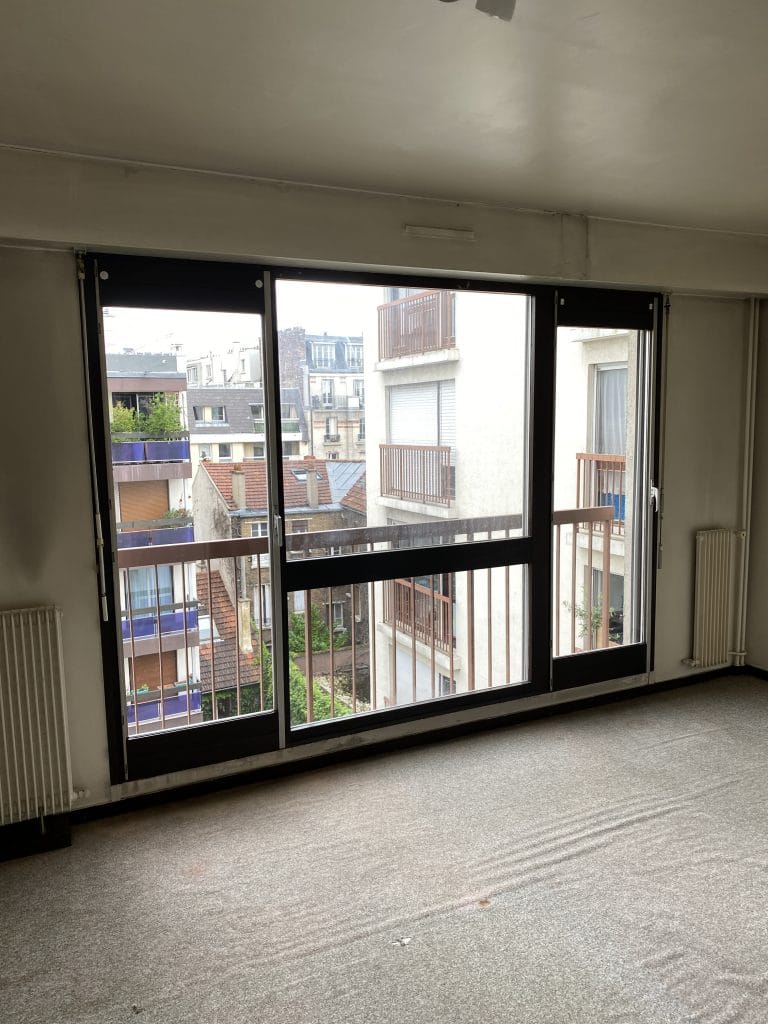 rénovation d'un appartement dans le 20ème arrondissement de Paris - pièce de vie avant travaux de rénovation