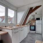 Vue sur la cuisine aménagée - Rénovation complète d'un appartement à Strasbourg par illiCO travaux