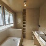 rénovation d'une salle de bain à Bilieu - béton ciré