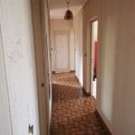 rénovation d'une maison à Biars-sur-Cère - couloir avant travaux de rénovation