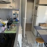 Cuisine vue depuis la fenêtre, avant travaux - Rénovation partielle d'un appartement à Bordeaux