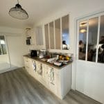 rénovation partielle d'une maison à Noisiel - cuisine avec verrière intérieure
