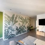 Salon avec papier peint panoramique - Rénovation d'un appartement à Saint Etienne en vue de sa mise en colocation