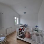 La chambre n'est plus mansardée - Surélévation d'une maison à Antony