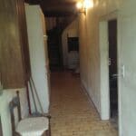 Couloir avant rénovation - Rénovation complète d'une maison à Saramon par illiCO travaux Auch