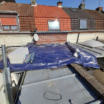 Rénovation de toiture plate et isolation intérieure Roubaix - bâche de protection