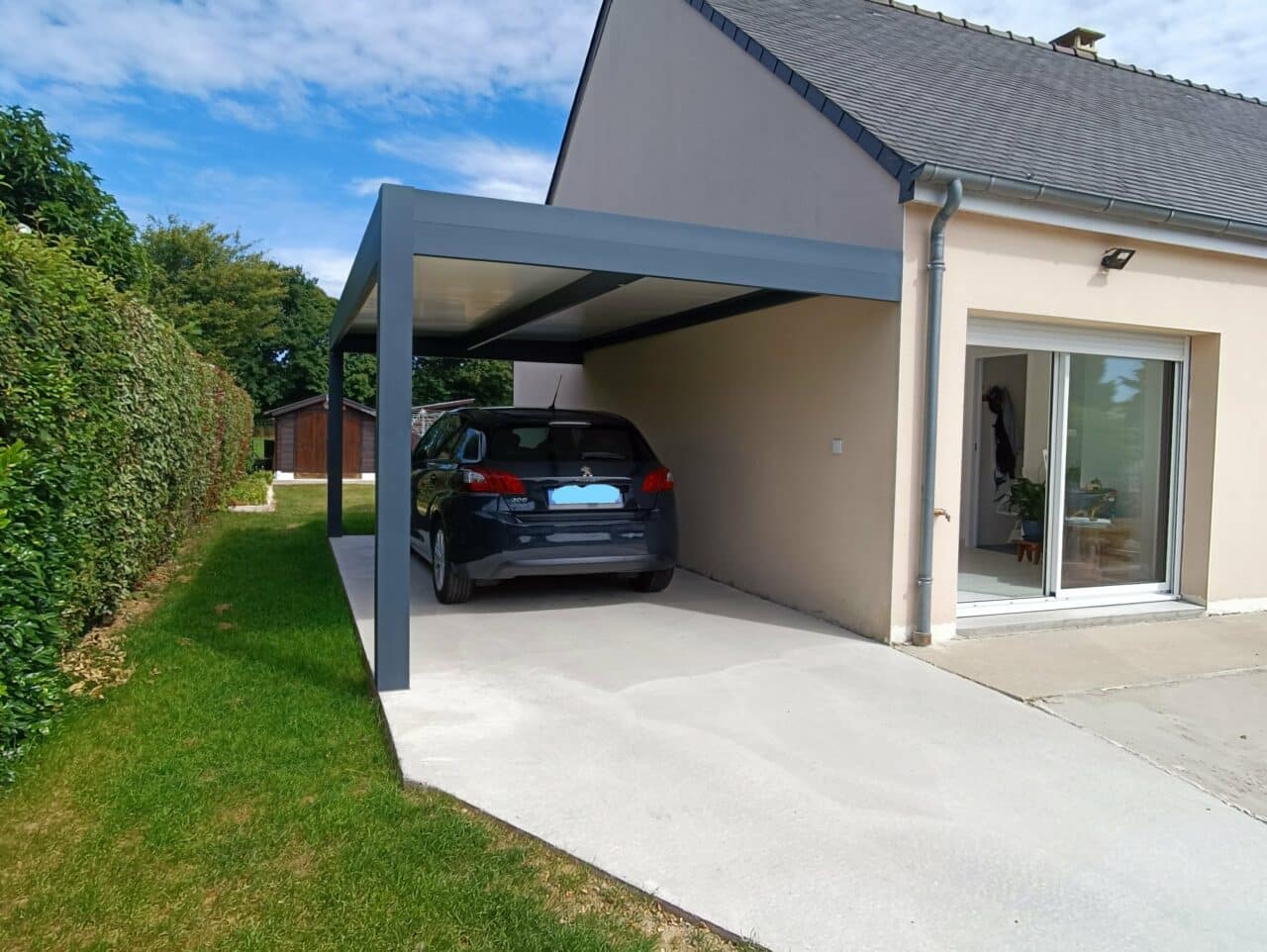 Aménagement d’un garage et création d’un carport à Landivy - carport après travaux