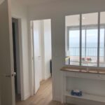 Rénovation d'un appartement à la Baule : verrière intérieure pour bénéficier de la vue sur mer