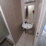 Rénovation de salle de bain : carrelage et meuble vasque