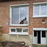 Création d'une terrasse à Bondue près de Lille : pose d'une baie vitrée avant pose de terrasse