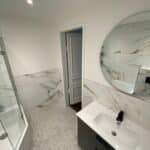 Rénovation d’un appartement haussmannien Lille - salle de bain meuble vasque noir