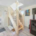 Rénovation de dépendance à Cernay - entrée escalier bois et poêle