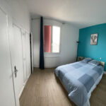 Rénovation d'un appartement à Sens par illiCO travaux Sens Montereau : chambre rénovée
