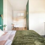 Rénovation d'un appartement à Mâcon par illiCO travaux Mâcon : chambre rénovée