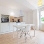 Rénovation d'un immeuble avec créations de 5 appartements à Jasseron : cuisine aménagée