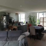 Rénovation d'un appartement à Plouhinec par illiCO travaux Lorient : salon rénové