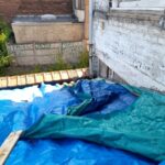 Remplacement d'une toiture en amiante à Lille (59) - pose d'une bâche sur la toiture à rénover
